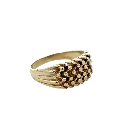 9ct yellow gold keeper ring in size W1/2 with engraved design, crafted by Reeves and Sons.