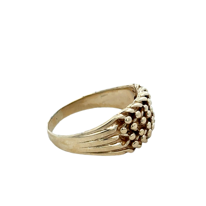9ct yellow gold keeper ring in size W1/2 from Reeves and Sons, showcasing a smooth, polished finish with a secure band design.