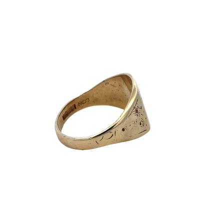 9ct yellow gold signet ring in size V with engraved surface, crafted by Reeves and Sons.