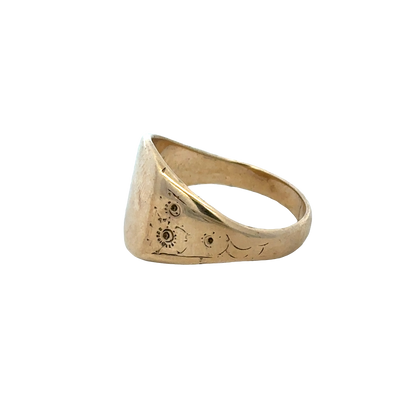 Yellow gold signet ring in size V featuring a smooth polished surface, crafted by Reeves and Sons.