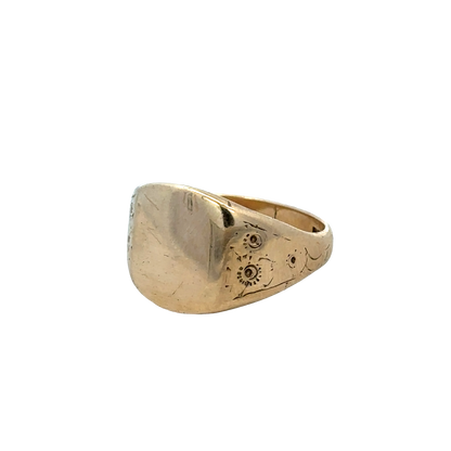 9ct yellow gold signet ring in size V with engraved design, crafted by Reeves and Sons, displayed on a neutral background.