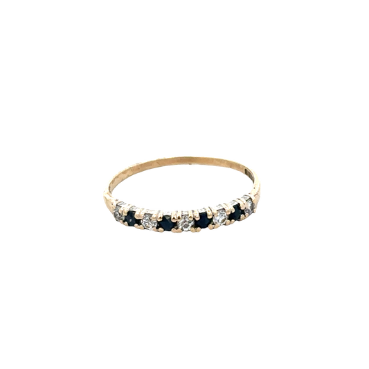 9ct yellow gold ring in size N1/2 by Reeves and Sons, featuring a smooth polished band.