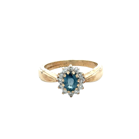 9ct yellow gold sapphire and diamond ring in size M1/2 featuring a central sapphire and sparkling diamonds, crafted by Reeves and Sons.