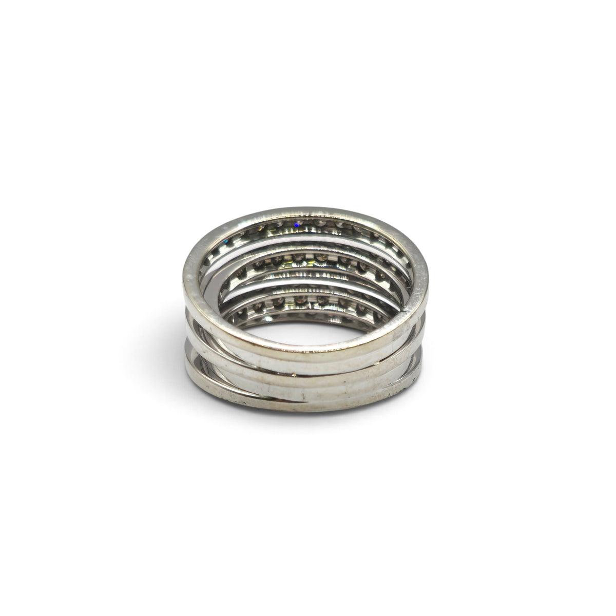 Nine-carat white gold five-row diamond ring by Reeves and Sons, showcasing sparkling diamonds and intricate design.
