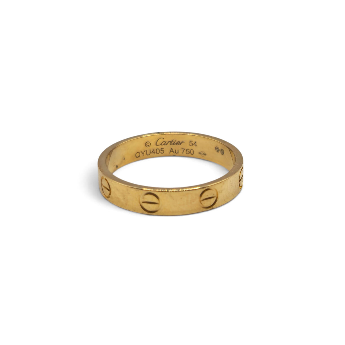 18ct yellow gold Cartier Love ring with screw motifs, displayed on a neutral background, showcasing its elegant design.