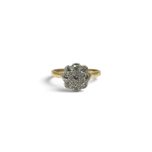 18ct yellow gold diamond cluster ring by Reeves and Sons with sparkling diamonds and a polished band.