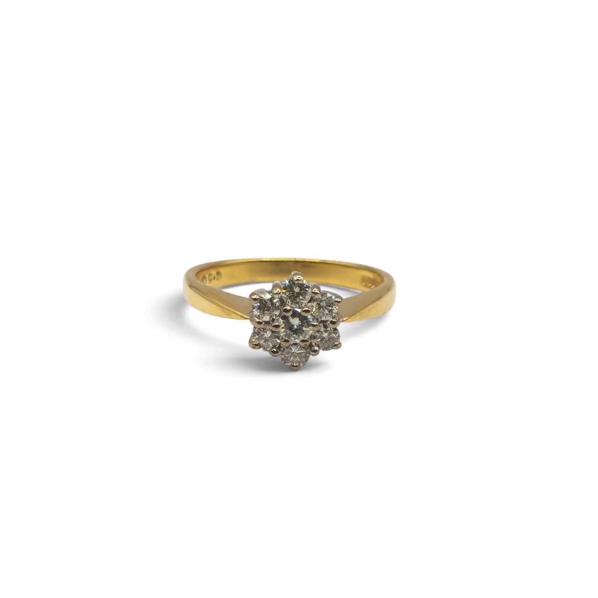 18ct yellow gold diamond cluster ring by Reeves and Sons, showcasing a sparkling diamond cluster design on a polished gold band.