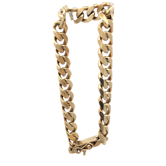9ct yellow gold curb bracelet with Reeves and Sons branding, showcasing polished links and weight of 40.7g.
