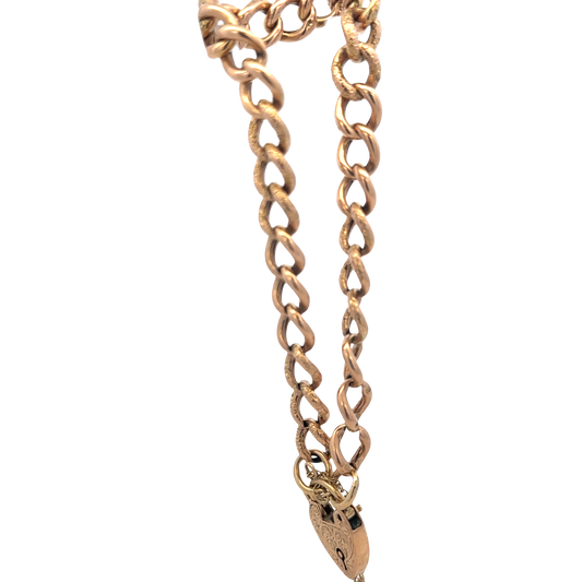 Reeves and Sons 9ct yellow gold bracelet with 12.6g, featuring a sleek, polished design and secure clasp.