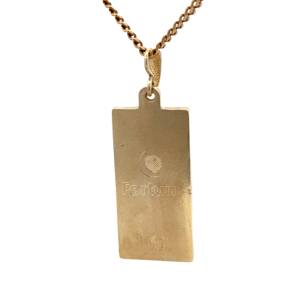 9ct yellow gold ingot pendant weighing 34.2g, Reeves and Sons jewelry with a polished, rectangular gold ingot design.