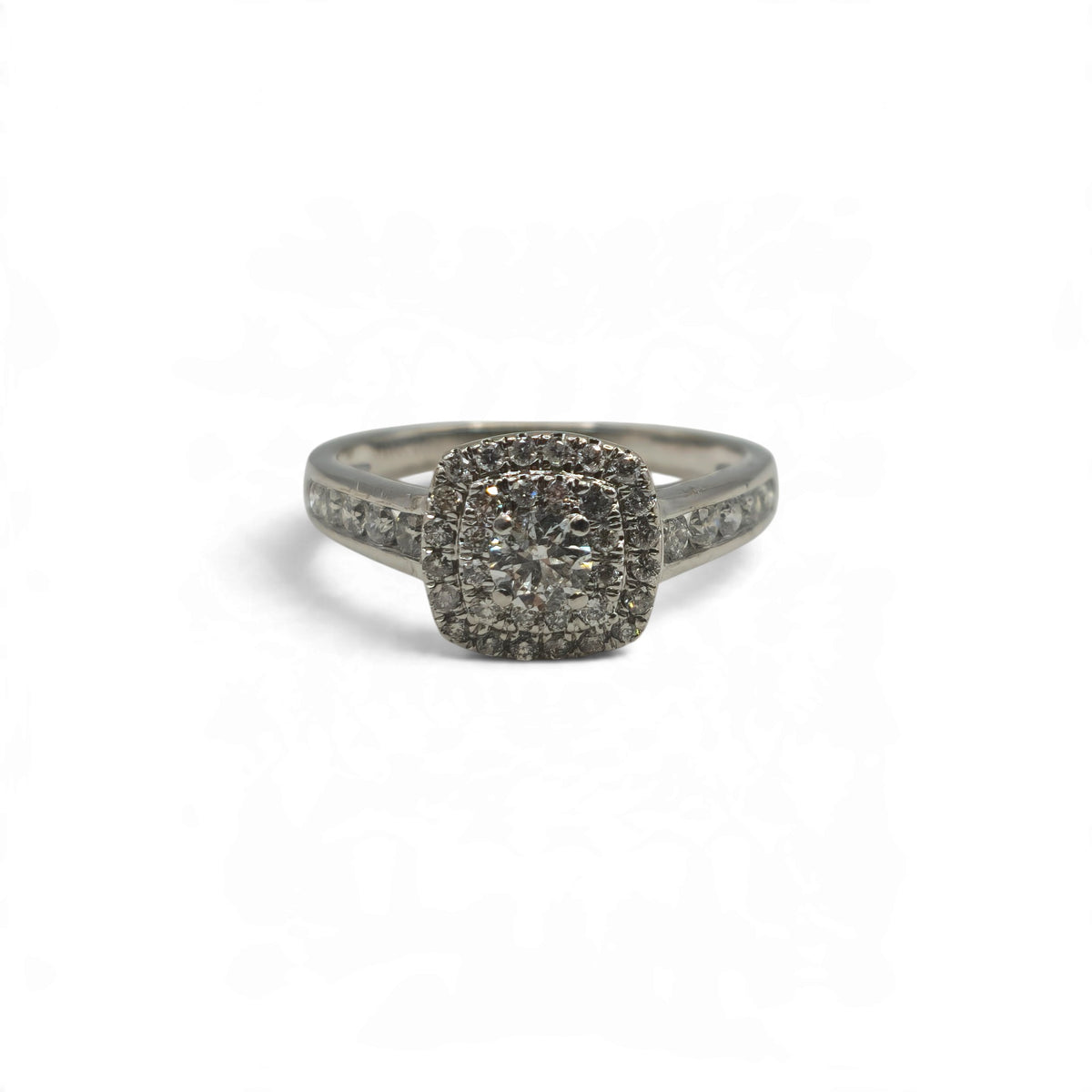 18ct white gold diamond cluster ring by Reeves and Sons, showcasing a sparkling diamond cluster design on a polished band.