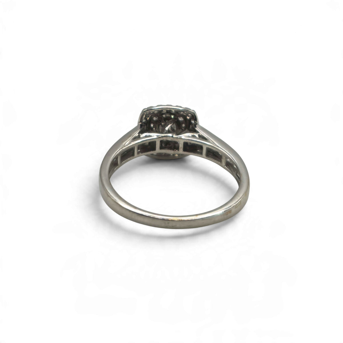 18ct white gold diamond cluster ring by Reeves and Sons, featuring a sparkling diamond cluster and elegant design.