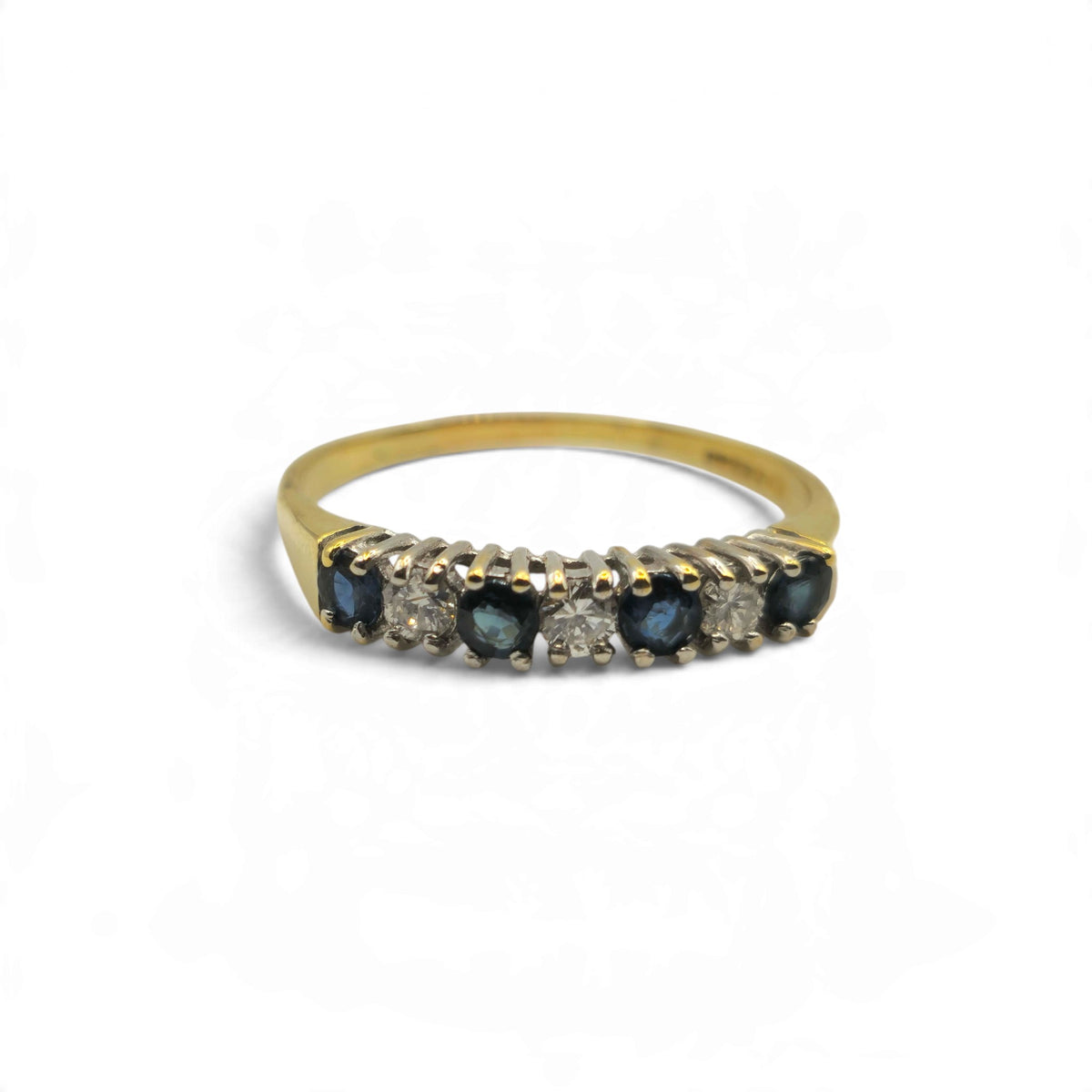 18ct yellow gold sapphire and diamond half eternity ring by Reeves and Sons, showcasing a band with alternating sapphires and diamonds.
