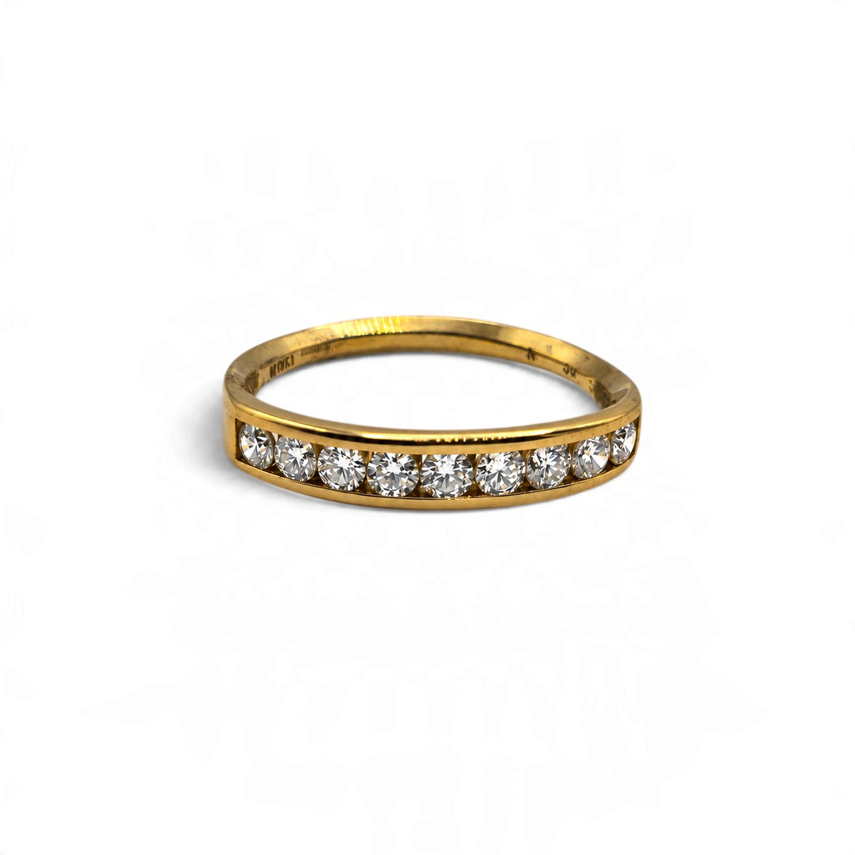 Reeves and Sons 18ct yellow gold half eternity ring with a classic band design