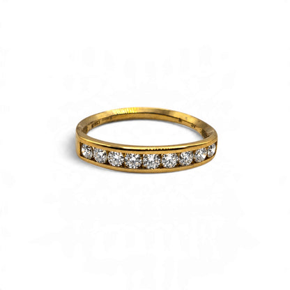 Reeves and Sons 18ct yellow gold half eternity ring with a classic band design