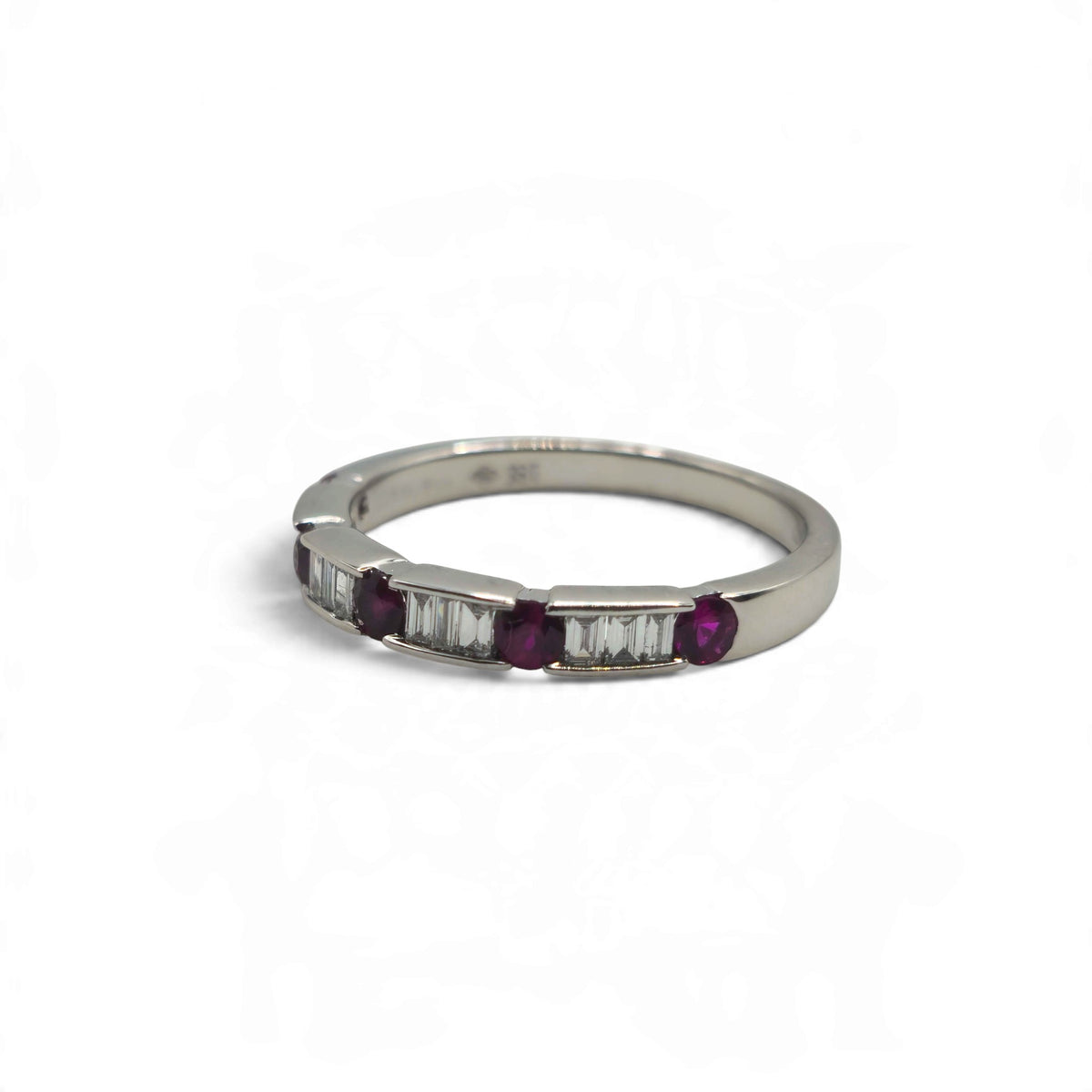 18ct white gold ruby and diamond eternity ring by Reeves and Sons