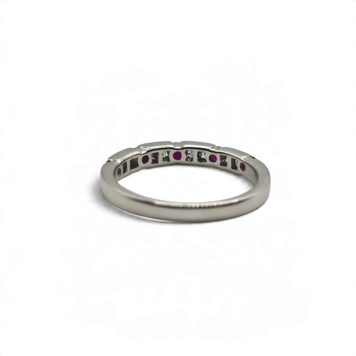 18ct white gold ruby and diamond eternity ring by Reeves and Sons