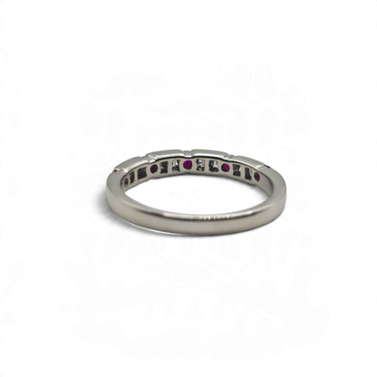 18ct white gold ruby and diamond eternity ring by Reeves and Sons