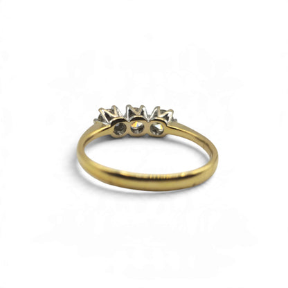 18ct yellow gold 3 stone diamond ring by Reeves and Sons with three sparkling diamonds