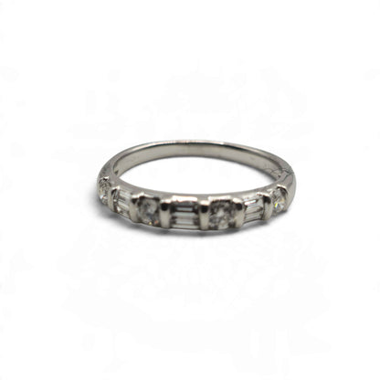 Reeves and Sons 18ct white gold half eternity ring with a classic band design