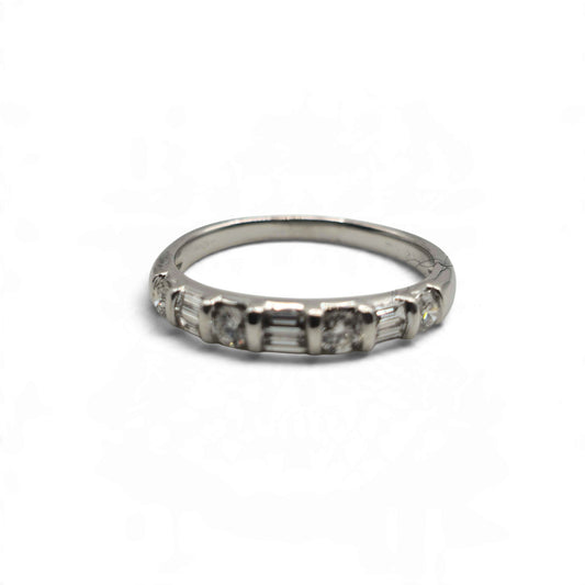 Reeves and Sons 18ct white gold half eternity ring with a classic band design