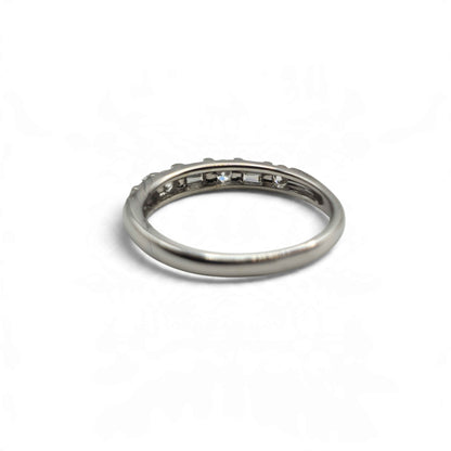 18ct white gold half eternity ring by Reeves and Sons, featuring a continuous row of gemstonesWinvalid