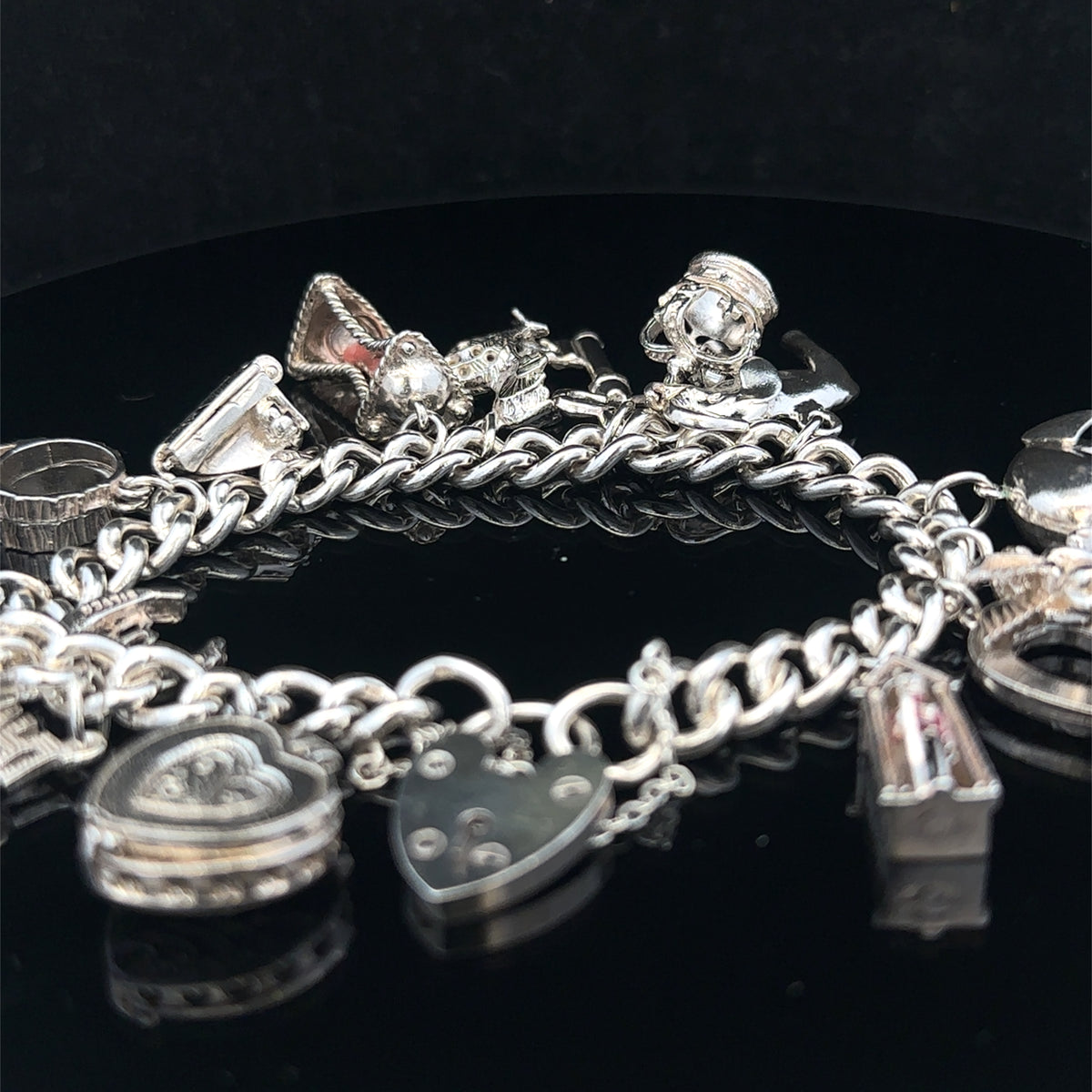 Silver charm bracelet 67.4g (sh25533l)