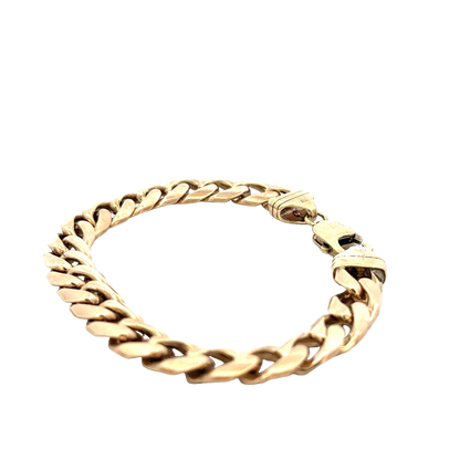 Reeves and Sons 9ct yellow gold curb bracelet with a polished finish and weight of 42.4g, displayed on a plain background.