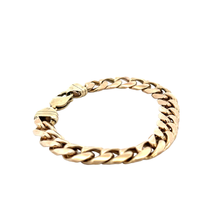 9ct yellow gold curb bracelet by Reeves and Sons with a polished finish, weighing 42.4g, shown on a neutral background.