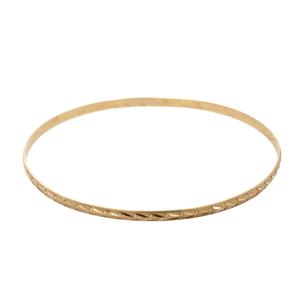 9ct yellow gold bangle by Reeves and Sons, weighing 4.2g, shown with a smooth, polished finish and elegant design.