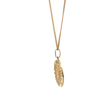 9ct yellow gold chain with St. Christopher pendant, Reeves and Sons jewelry, showing the detailed gold chain and religious pendant.