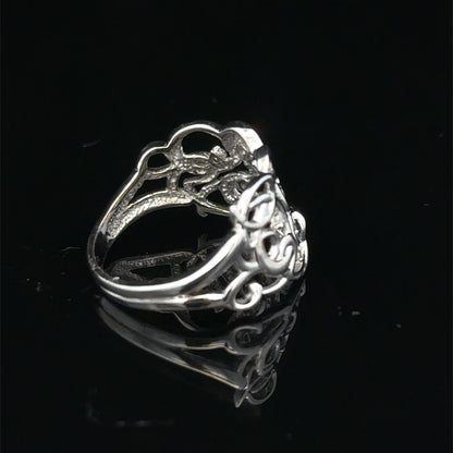 9ct white gold diamond ring size K1/2 by Reeves and Sons, featuring a sparkling diamond centerpiece and elegant design.