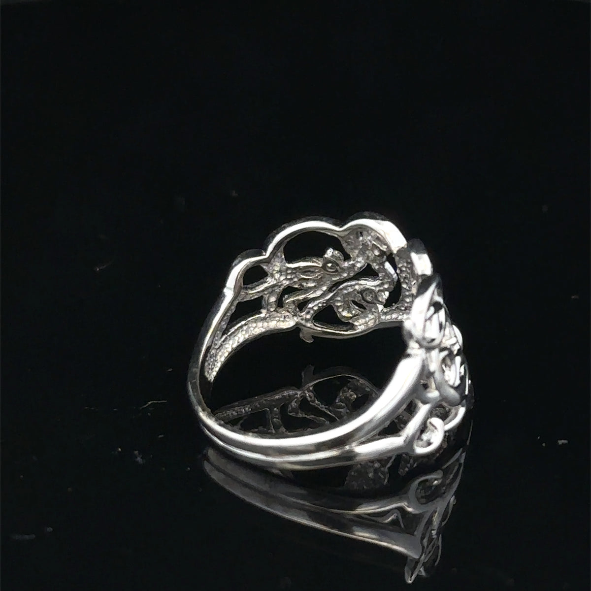 9ct white gold diamond ring size K1/2 by Reeves and Sons, featuring sparkling diamonds and a sleek, elegant design.