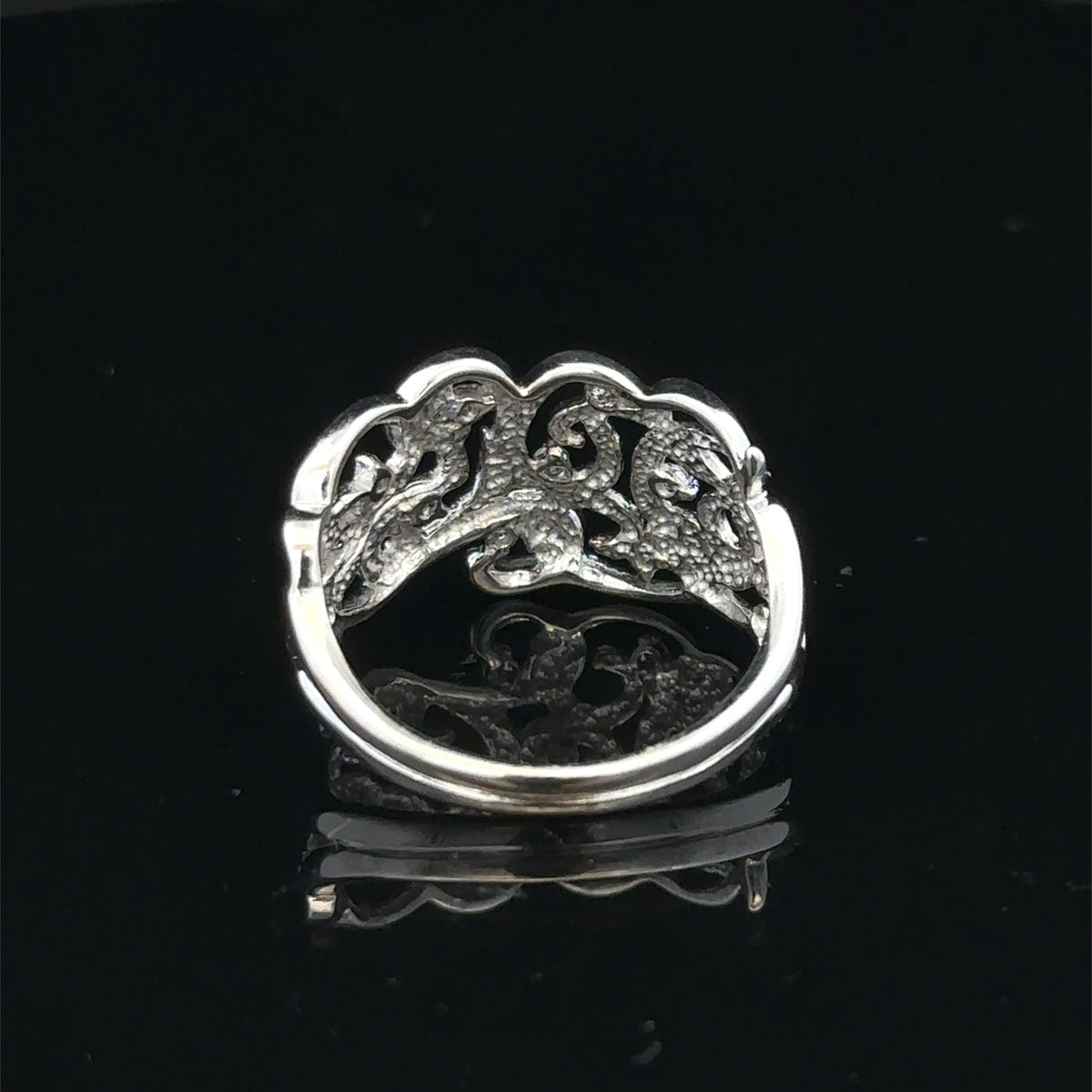 9ct white gold diamond ring size K1/2 by Reeves and Sons, featuring a sparkling diamond setting on a polished band.