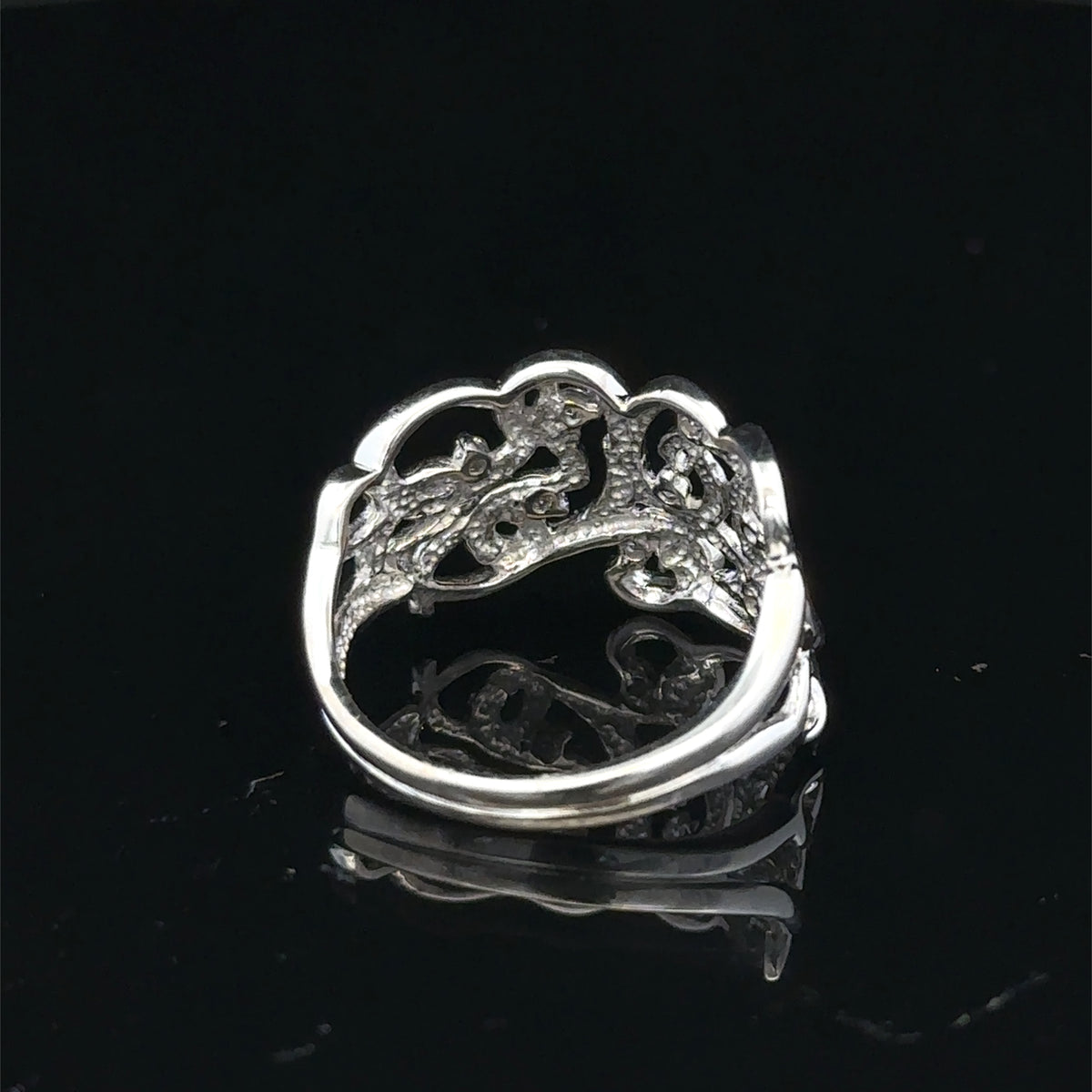 9ct white gold diamond ring size K1/2 with sparkling diamonds, showcasing Reeves and Sons craftsmanship.
