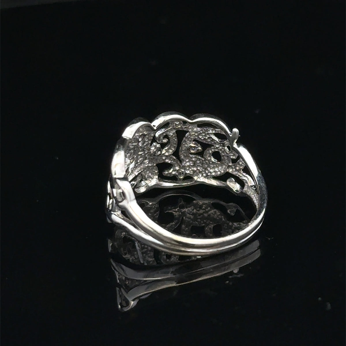 9ct white gold diamond ring size K1/2 with sparkling diamonds, crafted by Reeves and Sons, displayed on a white background