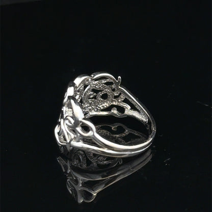 9ct white gold diamond ring size K1/2 featuring sparkling diamonds, crafted by Reeves and Sons, with intricate band details.