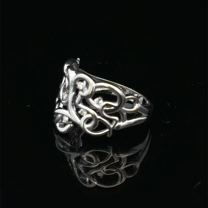9ct white gold diamond ring in size K1/2 featuring sparkling diamonds, crafted by Reeves and Sons.