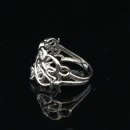 9ct white gold diamond ring with sparkling stones, size K1/2, from Reeves and Sons, showcasing elegant craftsmanship and design.
