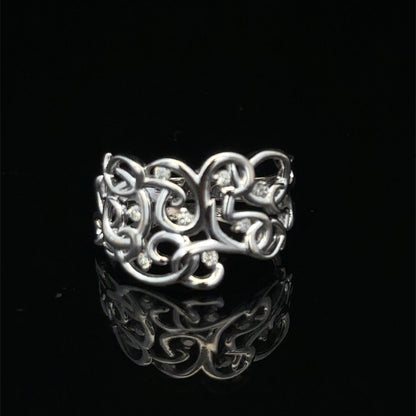 9ct white gold diamond ring in size K1/2 by Reeves and Sons, featuring a sparkling diamond design.