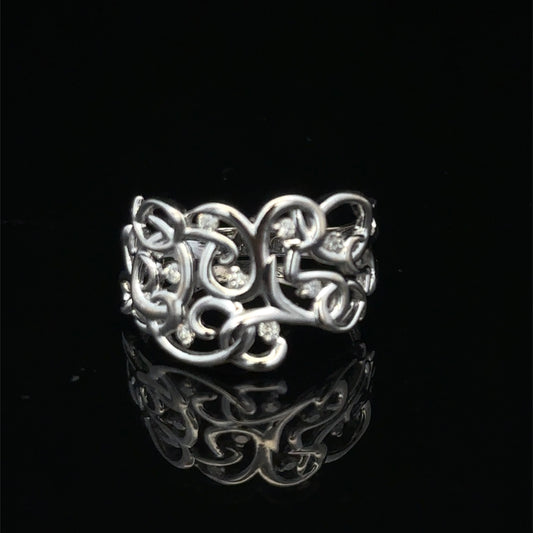 9ct white gold diamond ring in size K1/2 by Reeves and Sons, featuring a sparkling diamond design.