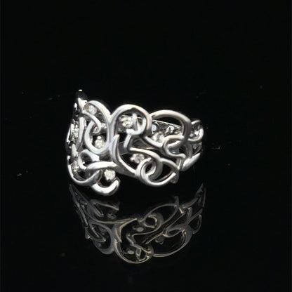 9ct white gold diamond ring size K1/2 with sparkling diamonds, crafted by Reeves and Sons, shown on a plain background.