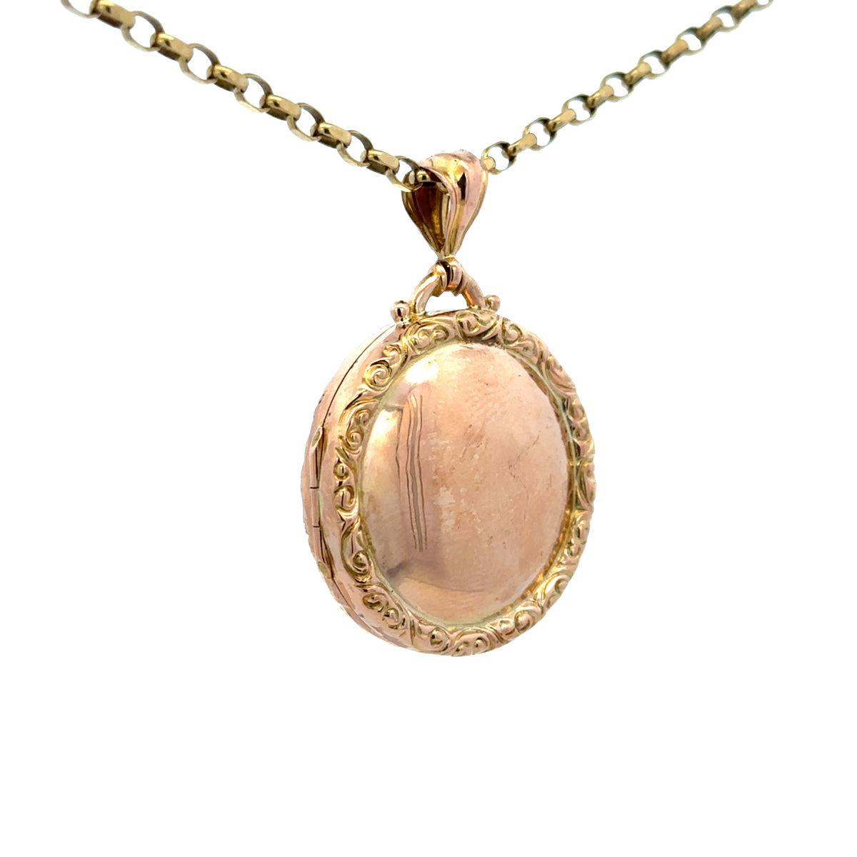 Reeves and Sons 9ct yellow gold locket pendant, 7.5g, showcasing a polished, classic design with a smooth surface and detailed craftsmanship.