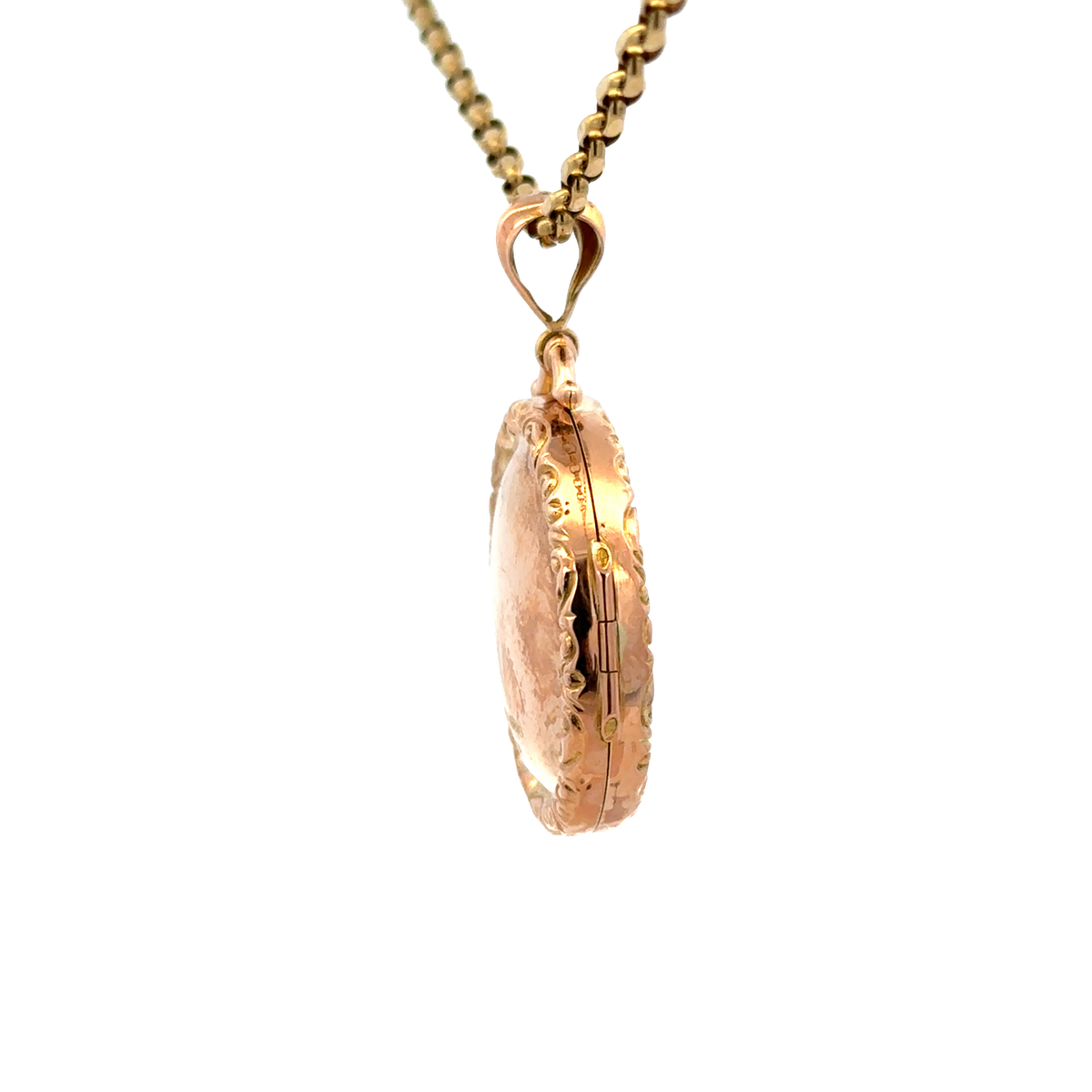 9ct yellow gold locket pendant from Reeves and Sons, showcasing a detailed, polished jewelry piece with a secure hinge clasp.
