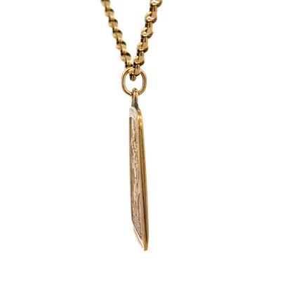 9ct yellow gold St Christopher pendant by Reeves and Sons, detailed religious jewelry, weighs 10.5g, shown on a plain background.