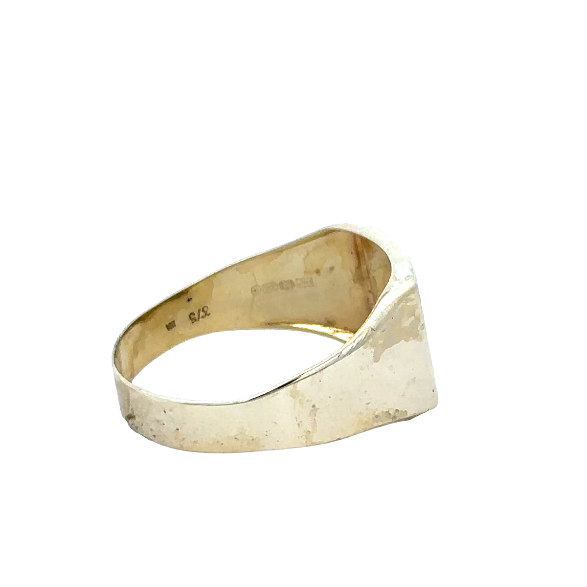 9ct yellow gold signet ring in size X with engraved face, crafted by Reeves and Sons, shown in a close-up image.