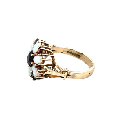 9ct yellow gold ring in size N with a smooth band, crafted by Reeves and Sons, shown in a close-up image.