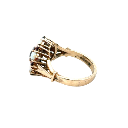 9ct yellow gold ring in size N with a smooth band, crafted by Reeves and Sons, shown close-up on a plain background.