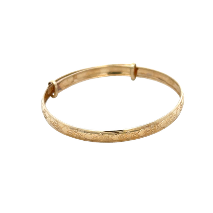 9ct yellow gold baby bangle weighing 2g with smooth, polished finish, designed for infants, by Reeves and Sons.