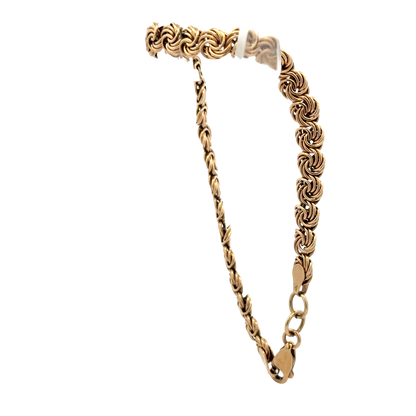 Reeves and Sons 9ct yellow gold bracelet weighing 4.8g, featuring a sleek, polished design with a secure clasp.